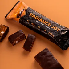 Barra De Proteína Radiance Joy Golden Milk Essential 50g Foto mini  2