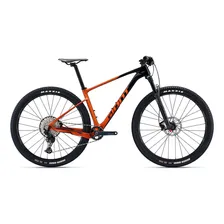 Bicicleta mountain bike Giant XTC Advanced 2 2022 R29 tamanho do uadro M - black/amber glow Foto mini 1