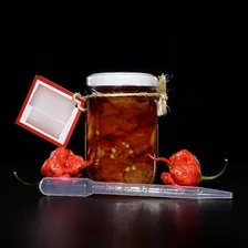 Carolina Reaper In Natura Curtida No Azeite - Vidro 150 Foto mini  2
