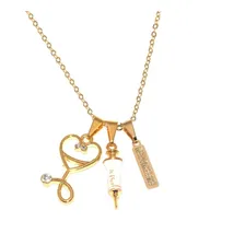 Colar Enfermagem Placa Seringa E Esteto Folheada A Ouro Cor Dourado Foto  mini 1