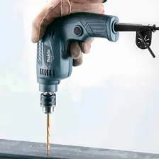 Furadeira parafusadeira elétrica de 6.5mm Makita M6501G 230W + accesorio 127V Foto mini 3