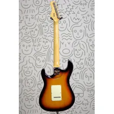 Guitarra Tagima T635 Stratrocaster Escala Clara Sunburst Corpo Em Alder Braço Em Maple Captadores Em Alnico Ponte 2 Pivos Tarraxas Vintage Nut De Osso Com Palheta Groover Foto mini 4