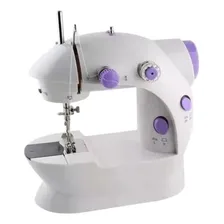 Mini máquina de costura portátil Mini máquina de costura Foto mini  2